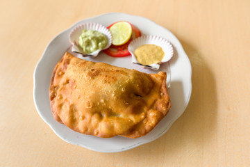 Home made peruvian Patty "empanada" in a plate.