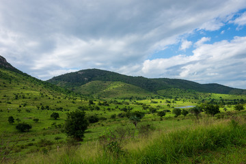Naklejka premium landscape with mountains and clouds