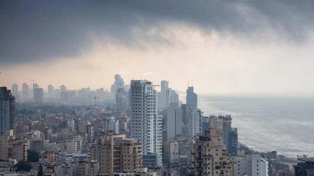 Cinemagraph of an Aerial view of a residential neighborhood in a city during a cloudy sunrise. Taken in Netanya, Center District, Israel. Still Image Continuous Animation