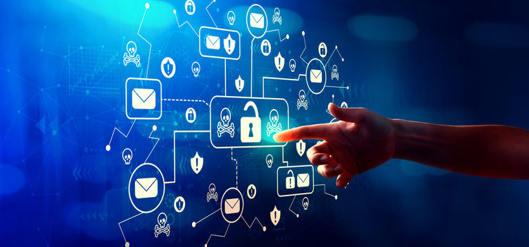 Email virus and scam theme with hand pressing a button on a technology screen
