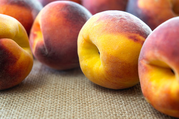 Fresh Ripe Peaches in a Row, Close Up