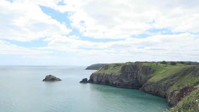 Timelapse of cliff with blue sky