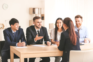 Human resources commission interviewing woman in office