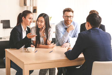 Human resources commission interviewing man in office