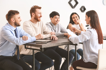 Human resources commission interviewing woman in office