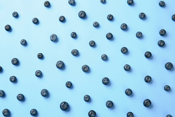 Many ripe blueberry on color background