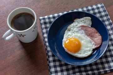 breakfast with fried eggs and coffee