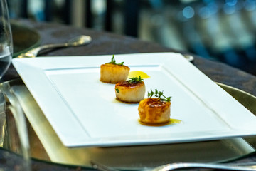 Gourmet food. Three pieces of gourmet food. 