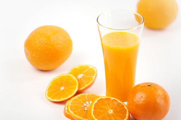 Fresh orange juice with fruits, isolated on white - Image