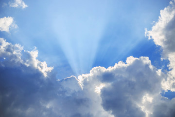 Sky sunlight and clouds/Blue sky is beautiful/Soft clouds and sky with sun rays/Nature creates a beautiful sky/