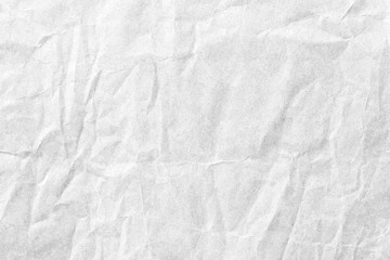 Fototapeta na wymiar Old crumpled white paper background texture