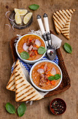 Thick soup with lentils, slices of meat and vegetables