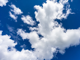 Obraz premium Blue Sky and White Clouds. Background Heaven. Amazing View. Sky Scenery. Beautiful view of Blue Sky.