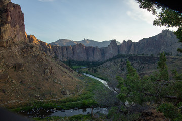 River flowing through Smith  Rock National Park as the sun rises in Oregon USA July 2019