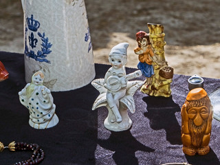 old porcelain figurines at the flea market in Tbilisi near