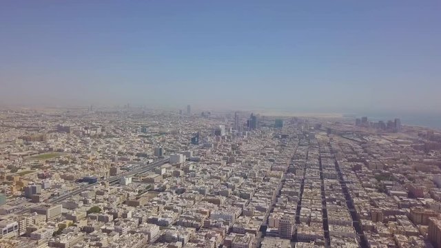 Aerial footage of Khobar shamaliyah suwaiket city along with Khobar Dammam highway with Khobar and Dammam skyline (4K)