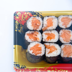 Sushi Roll with salmon on the white background .Food abstract background