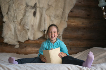 little girl and book