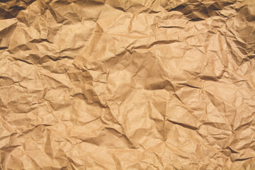 Textured crumpled sheet of Kraft paper
