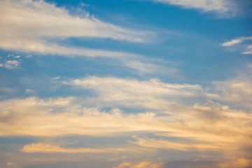 Blue and golden sky background, twilight sky after sunset.
