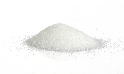 Heap of granulated sugar isolated on white background.