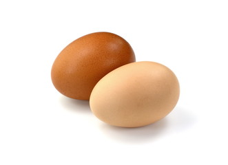 Two Raw Eggs on White Background.