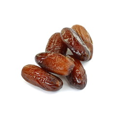 Dried dates over white background. Heap of dried dates isolated on white background.