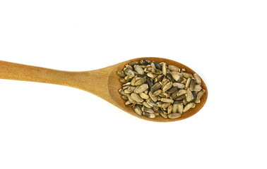Seeds of a Milk Thistle (Silybum marianum) known as Scotch Thistle or Marian Thistle. Seeds of a Milk Thistle in a wooden spoon isolated on white.