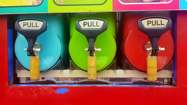 Close up machine frozen ice mix fruit handle colorful, Slurpee