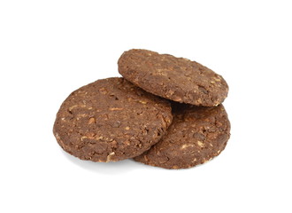 Round chocolate whole wheat biscuit, cookie with raisins isolated on white background. Chocolate Biscuits with whole-wheat (wholemeal) flour isolated on white background 