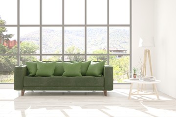 Stylish room in white color with sofa and summer landscape in window. Scandinavian interior design. 3D illustration