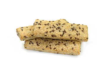 Breadsticks or grissini with sesame and linseed isolated on white background. Salt cracker isolated.