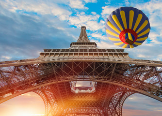 Hot air balloon flying over Eiffel tower - Paris, France