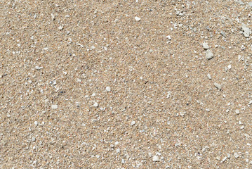 Sand on the coast of the sea close up. Natural abstract background