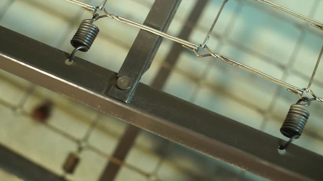 spring on a matress spring holder