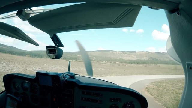 Person POV driving airplane on the ground 4K