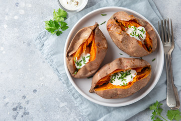 baked sweet potato with yogurt sause and chives