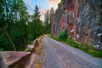 road between rock and precipice, mountain road