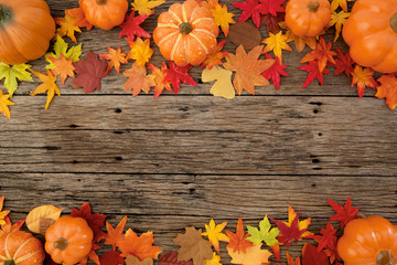 Autumn leaves on wooden background