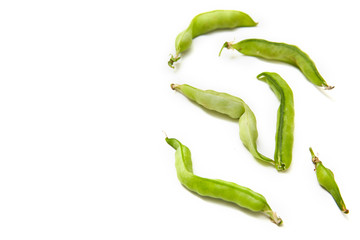 Ugly homegrown pea on a white background with copy space