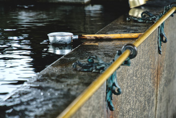water ladle and well at a japanese temple