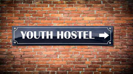 Fototapeta premium Street Sign to Youth Hostel