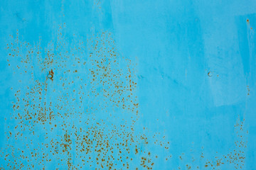 Old rusted metal texture. The surface of the blue iron wall. Perfect for background and grunge design.