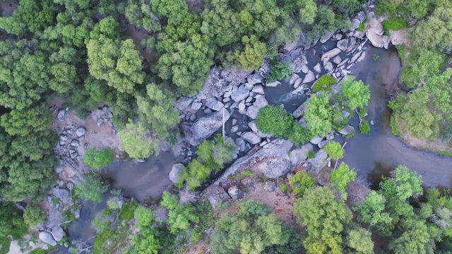 Aerial Top Down Drone Shot Descending into a River in the California Wilderness (Fresno River, Oakhurst, California)