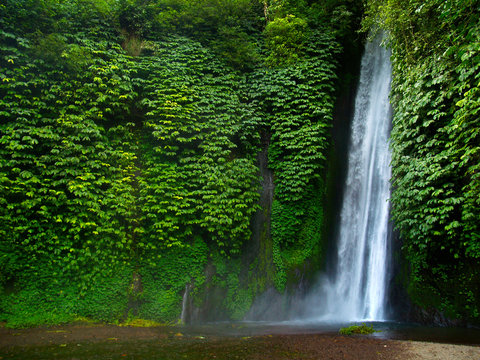 munduk waterfall in the middle of the rainforest in bali-indonesia