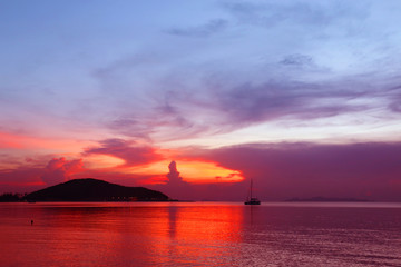 Naklejka na ściany i meble Photo background bright unusual sunset on the sea