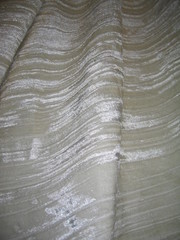 white draped background