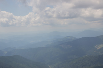Fototapeta premium Trekking in the Carpathians, Hike to the border between Ukraine and Romania from Pop Ivan Marmarassky to Pop Ivan Chernogorsky.