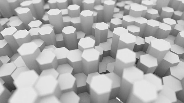 Flat Geometric shapes abstract background. Hexagonal pillars and oblate spheres move in a chaotic flow. Wide-angle camera and panning shooting video.