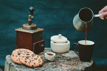 hot coffee with cookies in the studio